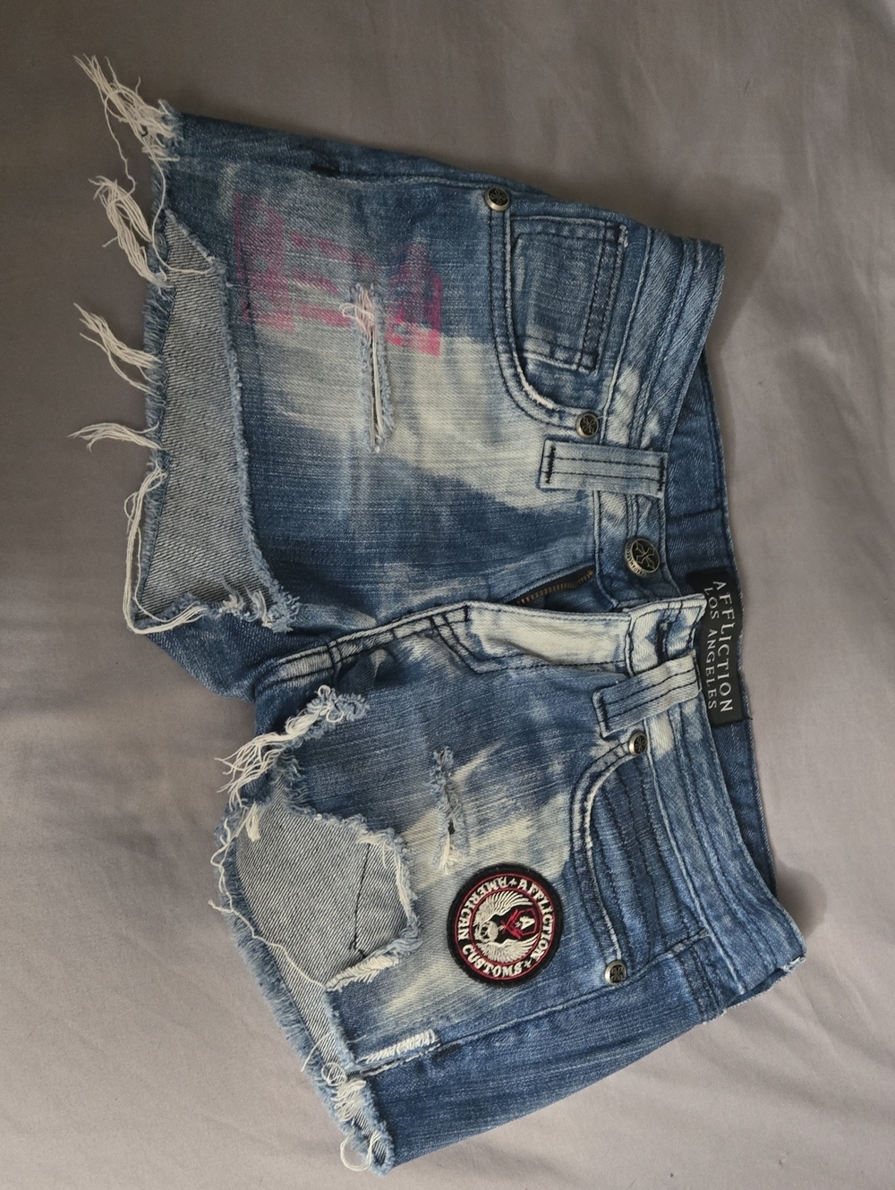 Affliction Blue Distressed Denim Cutoff Shorts with Pink Graphic